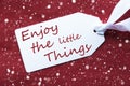 One Label On Red Background, Snowflakes, Quote Enjoy Little Things Royalty Free Stock Photo