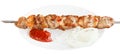 One lamb shish kebab on white plate isolated Royalty Free Stock Photo