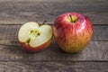 One large and one chopped apple Royalty Free Stock Photo