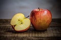 One large and one chopped apple Royalty Free Stock Photo