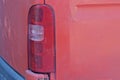 one large plastic red white taillight on metal car Royalty Free Stock Photo