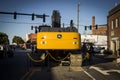 One large yellow John Deere Tractor