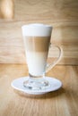 one latte coffee served in a clear glass Royalty Free Stock Photo