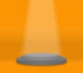 One layer gray round pedestal podium and orange background.The light shines down below.For place goods,cosmetic,cartoon model, Royalty Free Stock Photo