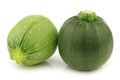 One light green and a green round zucchini