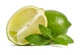 One lime with half of a juicy lime with leaves of mint Royalty Free Stock Photo