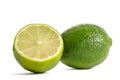 One lime with half of a juicy lime Royalty Free Stock Photo
