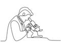 One Line Drawing of a Scientist Using a Microscope, Capturing the Essence of Research and Discovery Royalty Free Stock Photo