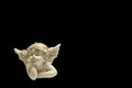 One little lying angel figurine Royalty Free Stock Photo