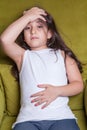 One little middle eastern beautiful small girl sitting feeling bad. Royalty Free Stock Photo