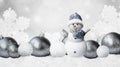 One little snowmen in caps on snow in the winter. Background with a funny snowman. Christmas card Royalty Free Stock Photo