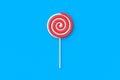 One lollipop on stick. Striped twisted candy