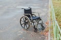 One lonely abandoned wheelchair outdoors