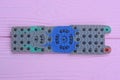 one long colored rubber gasket of a television remote control Royalty Free Stock Photo