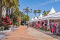 One of the main pretty squares in Ayamonte, Spain during the summer when there are stores selling clothes, sweets and souvenirs