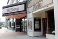 Old theater running a show, blinking lights on the marque, Jamestown, New York, Summer, 2021