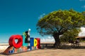 Sign of the city of Olinda next to a tree, in Alto da SÃ©, with the city of Recife in the background - Inst Royalty Free Stock Photo