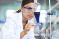 Asian Laboratory scientist working at lab with test tubes Royalty Free Stock Photo