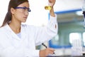 Asian Laboratory scientist working at lab with test tubes Royalty Free Stock Photo