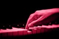 one male hand on the piano. The palm lies on the keys and plays the keyboard instrument in the music school. student Royalty Free Stock Photo