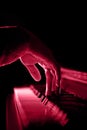 one male hand on the piano. The palm lies on the keys and plays the keyboard instrument in the music school. student Royalty Free Stock Photo