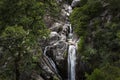 One man canyoning at the Arado Waterfall cascata do arado in the Peneda Geres National Park Royalty Free Stock Photo