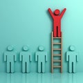 One man climbing ladder to standing on top above other green people Royalty Free Stock Photo