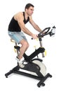 One man doing indoor biking exercise Royalty Free Stock Photo