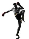 One man exercising thai boxing silhouette