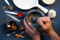 One man grinding spices