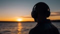 One man listening to nature serene beauty at dusk generated by AI