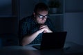 One man portrait using computer late at night Royalty Free Stock Photo