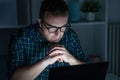 One man portrait using computer late at night Royalty Free Stock Photo
