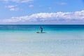 One man practicing stand up paddle