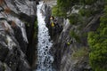 One man rappelling the Arado Waterfall cascata do arado in the Peneda Geres National Park Royalty Free Stock Photo