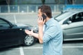 One man calling insurance roadside assistance reporting car accident problem Royalty Free Stock Photo