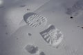 One man`s footstep on the fresh friable snow