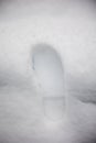 One man's footstep on the fresh friable snow