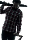 Man serial killer with shotgun silhouette portrait Royalty Free Stock Photo