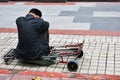 One man sit alone on pedestal