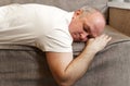 One man sleeping and snoring watching television Royalty Free Stock Photo