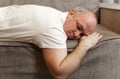 One man sleeping and snoring watching television Royalty Free Stock Photo