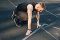 One man on the start line awaits the start of the sprint. stadium, rubber track. athletics competitions. Track and field runner in Royalty Free Stock Photo