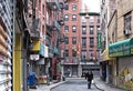 One Man Wearing Face Mask walking in NYC Lower East Side Streets with Closed Restaurants New York