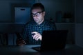 One man working late at night on computer Royalty Free Stock Photo