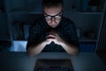 One man working late at night on computer Royalty Free Stock Photo