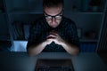 One man working late at night on computer Royalty Free Stock Photo