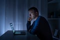 One man working late at night on computer Royalty Free Stock Photo