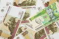 A manat from Turkmenistan with Russian one hundred ruble bills Royalty Free Stock Photo