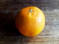 Mandarin fruit on wooden table